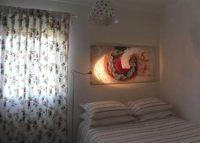 Casas Decá&delá Casa de Férias *